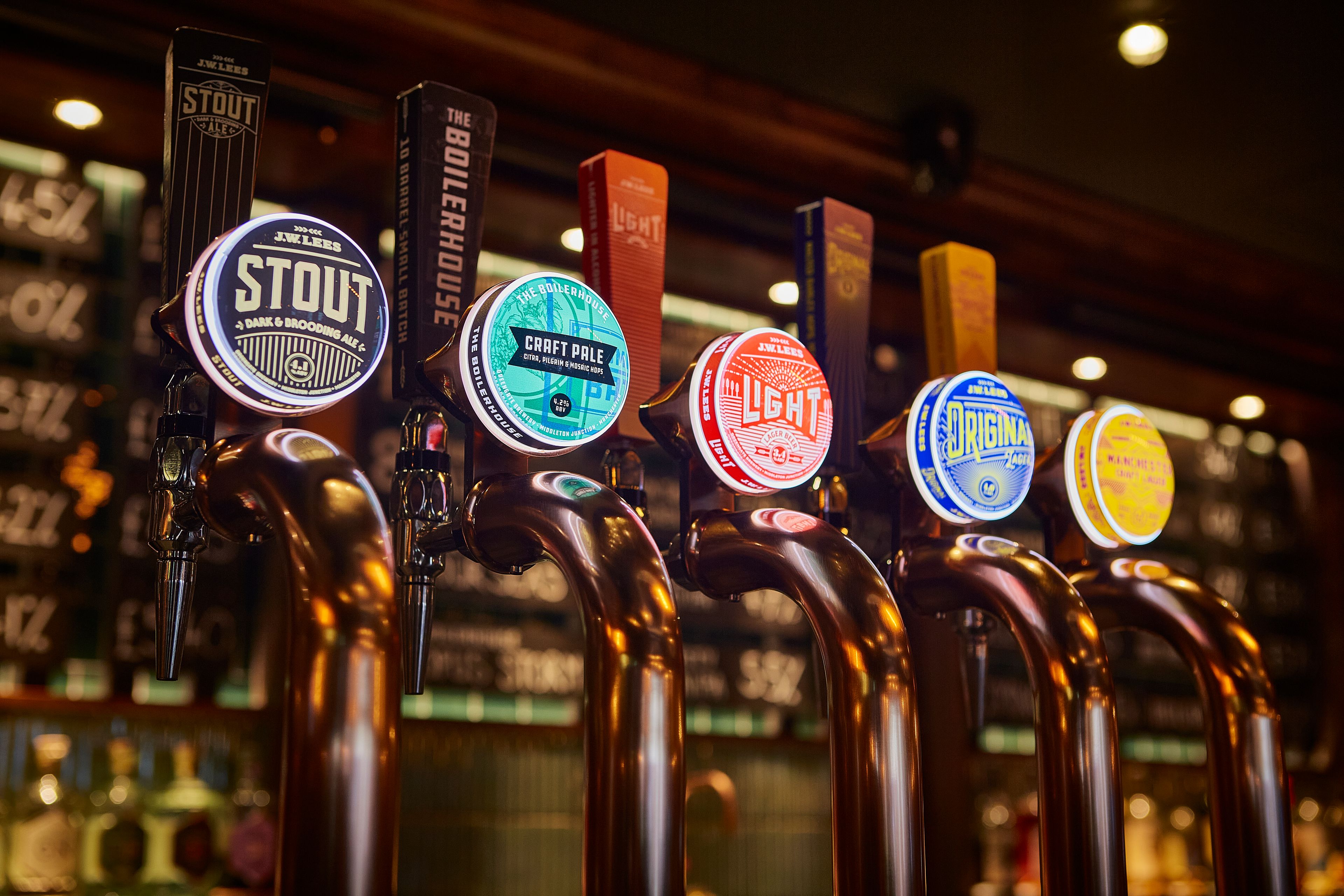 Draft pump handles by Stout By JW Lees, Manchester's oldest brewery